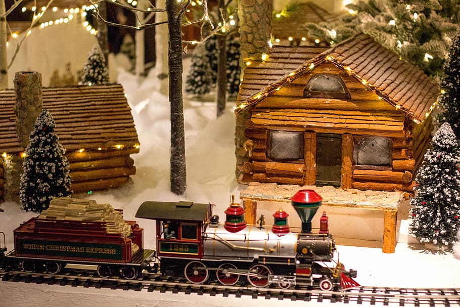 multicolored train toy near house, train toy on rail beside house miniature HD wallpaper