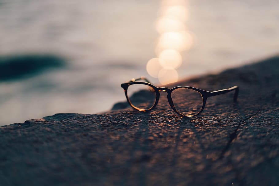 eyeglasses on gray concrete surface near water, frame, lens HD wallpaper