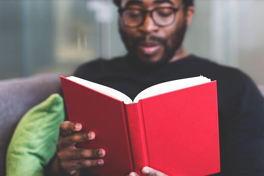 man in black crew-neck shirt reading red book, guy, business HD wallpaper