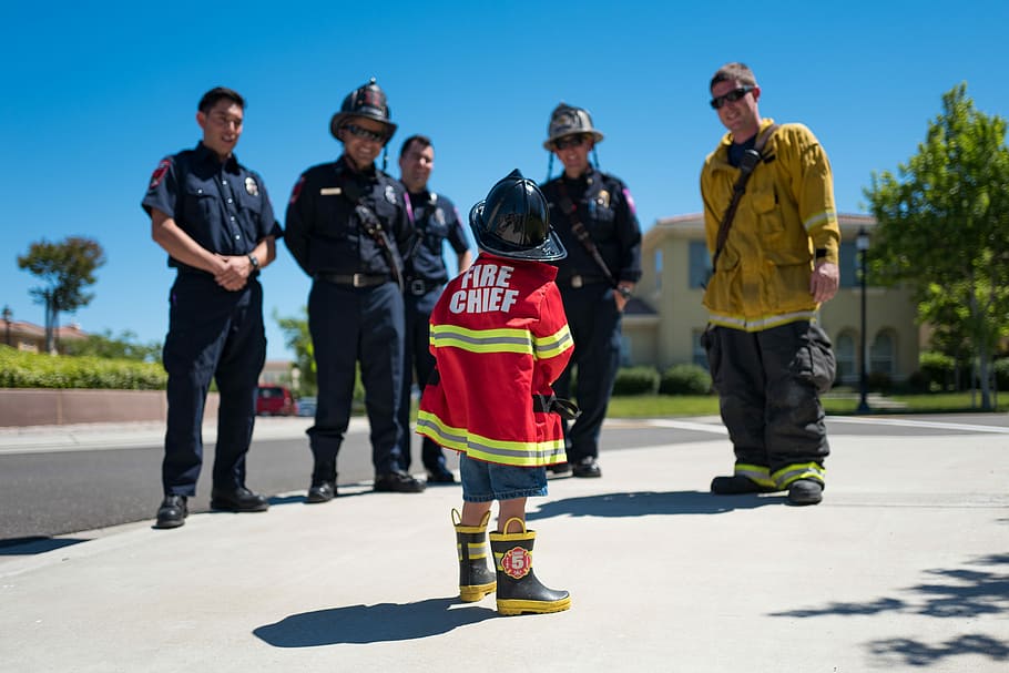 A Dream Come True, child in Fire Chief uniform standing in front of five men HD wallpaper