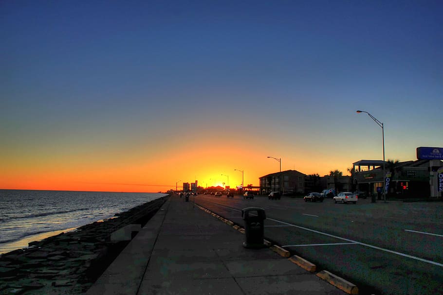 sunset, shore, sea, ocean, town, colors, dusk, road, sky, water HD wallpaper