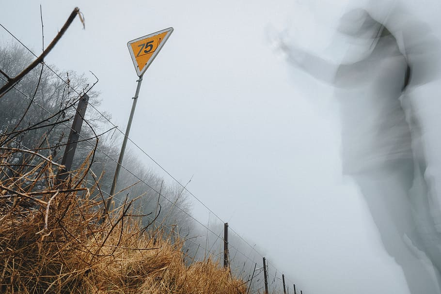 people, man, blur, moving, warning, sign, number, 75, grass HD wallpaper