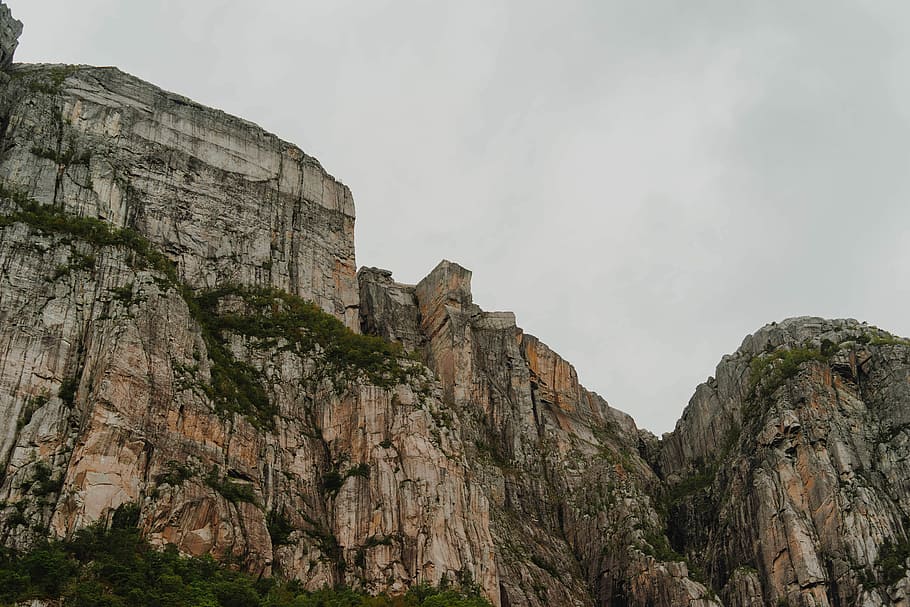 low-angle view photo of mountain, mountain during daytime, cliff HD wallpaper