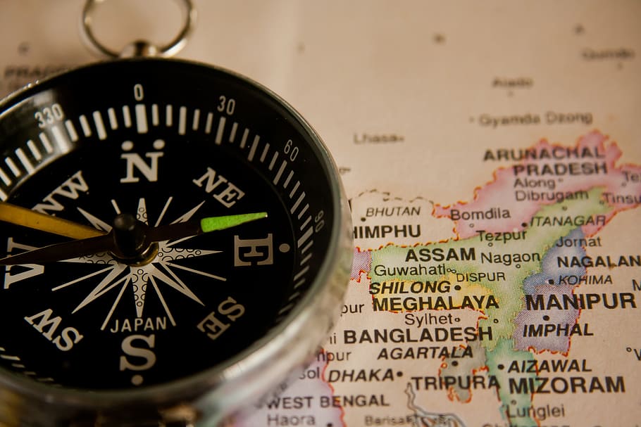 round silver-colored compass on map, navigation, direction HD wallpaper