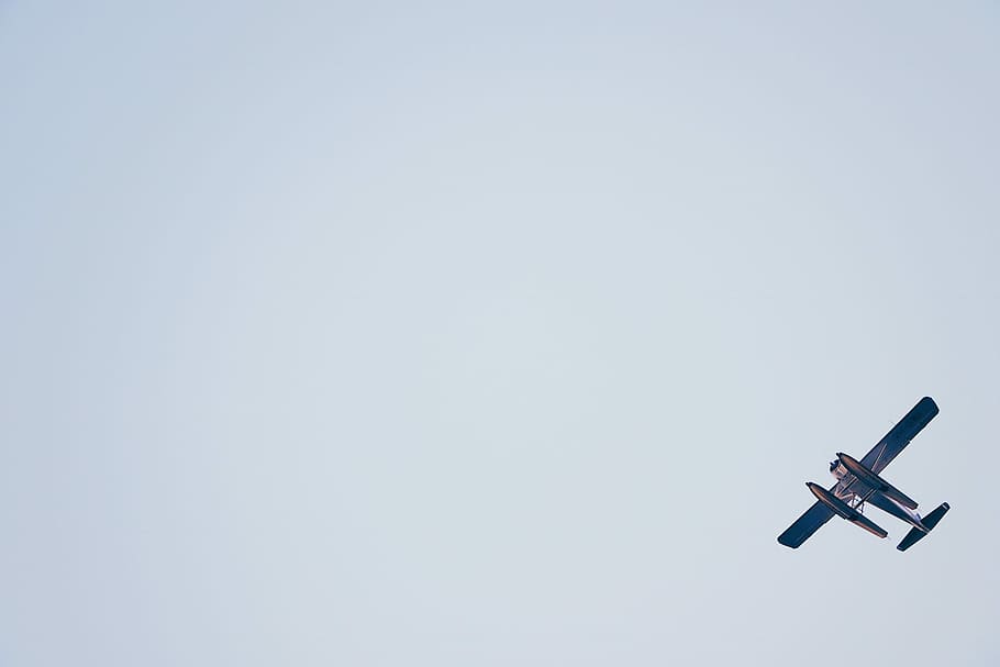 biplane on white sky, blue airplane mid-air, flying, flight, minimal HD wallpaper