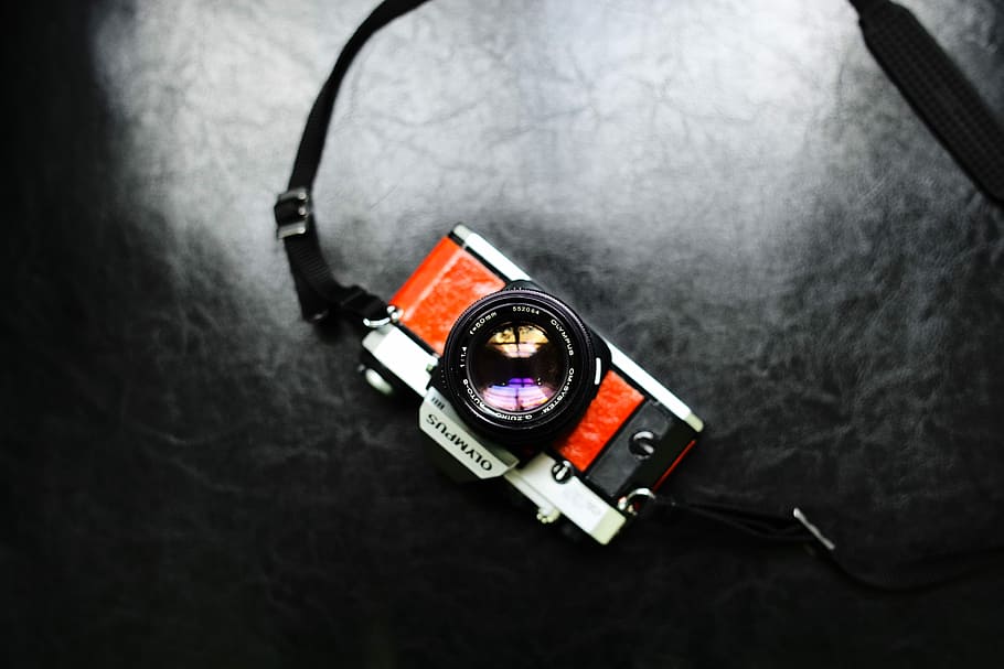 closeup photo of orange and gray Olympus DSLR camera, gray and black MILC HD wallpaper