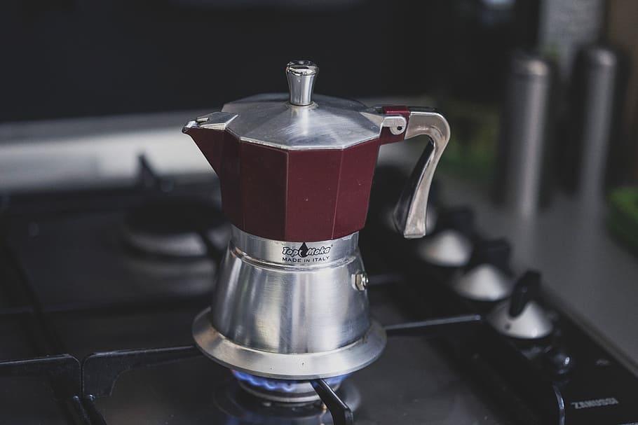 maroon and silver-colored kettle on stove, gray and red moka pot on top of turned on gas stove HD wallpaper