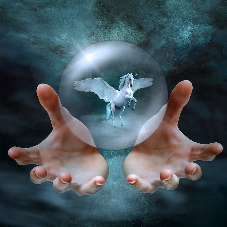 white Pegasus inside clear crystal ball, cd cover, fantasy, hands