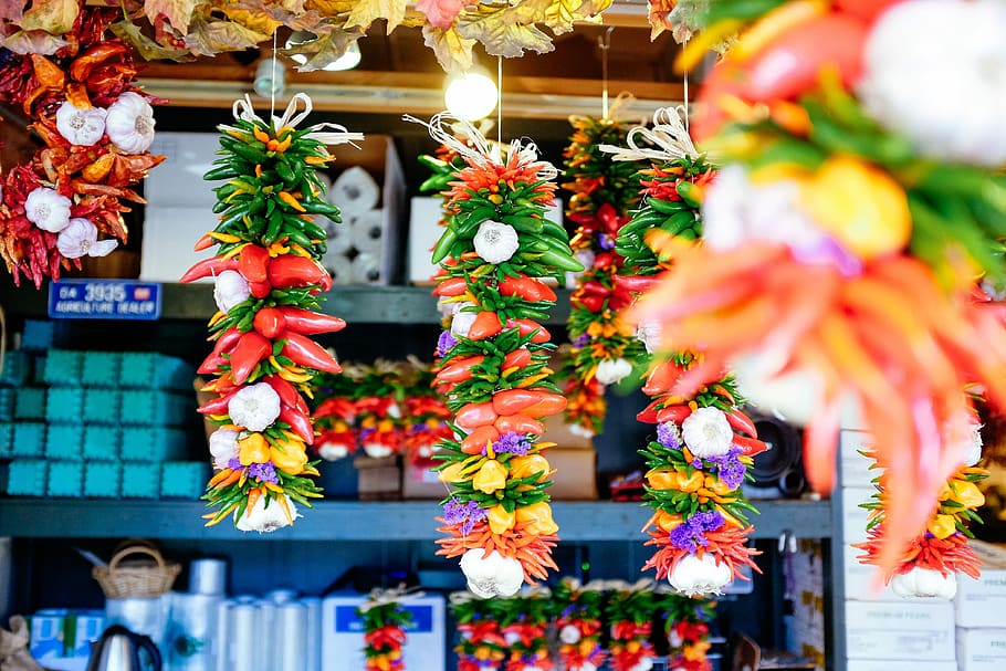 close up photo Chili hanging decors, flower, store, street, variation HD wallpaper