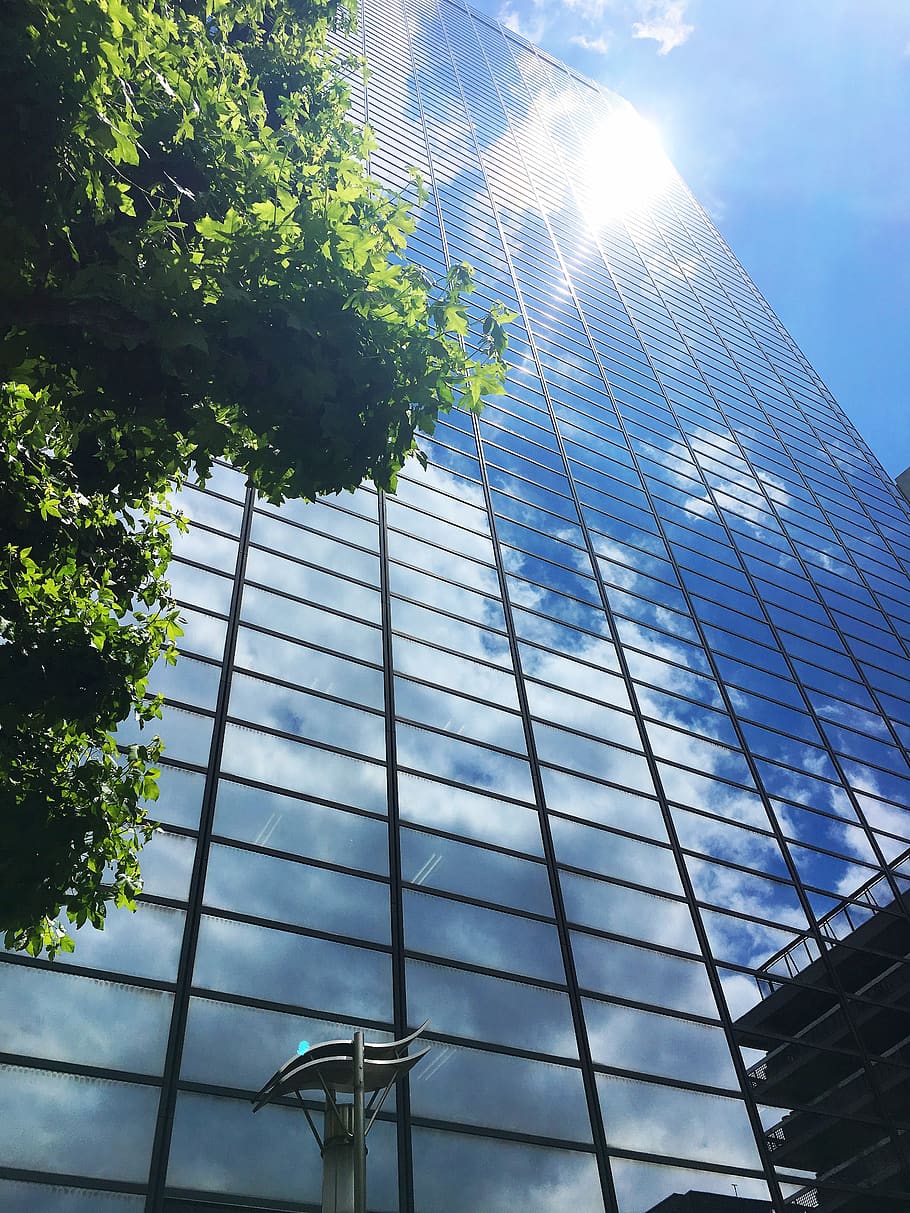 building, sun, sky, architecture, clouds, modern, light, skyscraper HD wallpaper