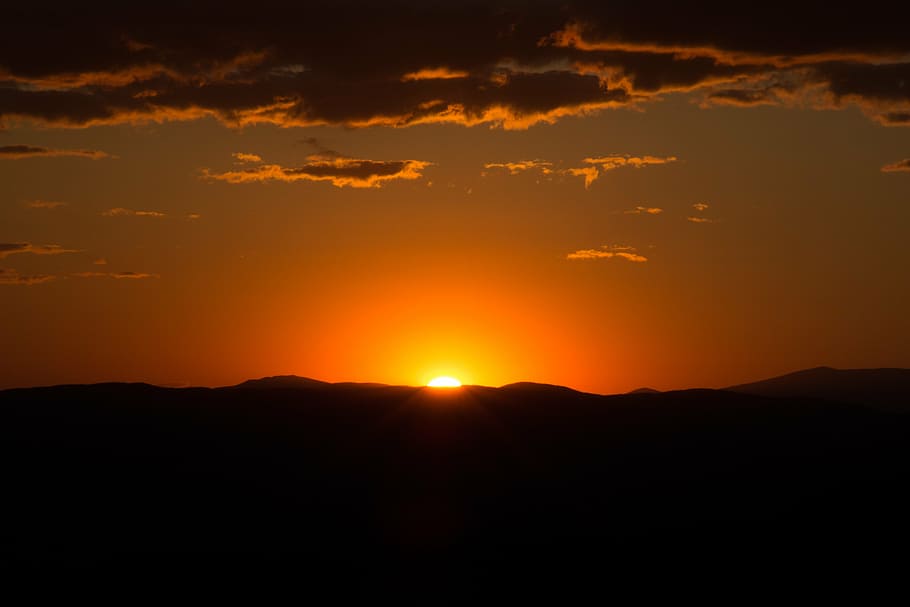landscape photography of golden sun peeping against mountain HD wallpaper
