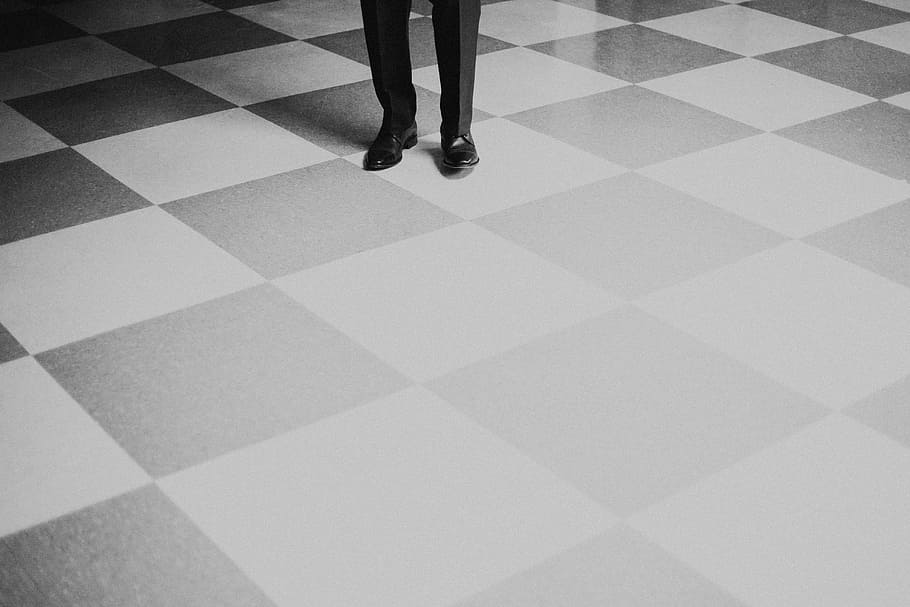 person standing on gray and black checkered floor, person standing on tiled floor HD wallpaper