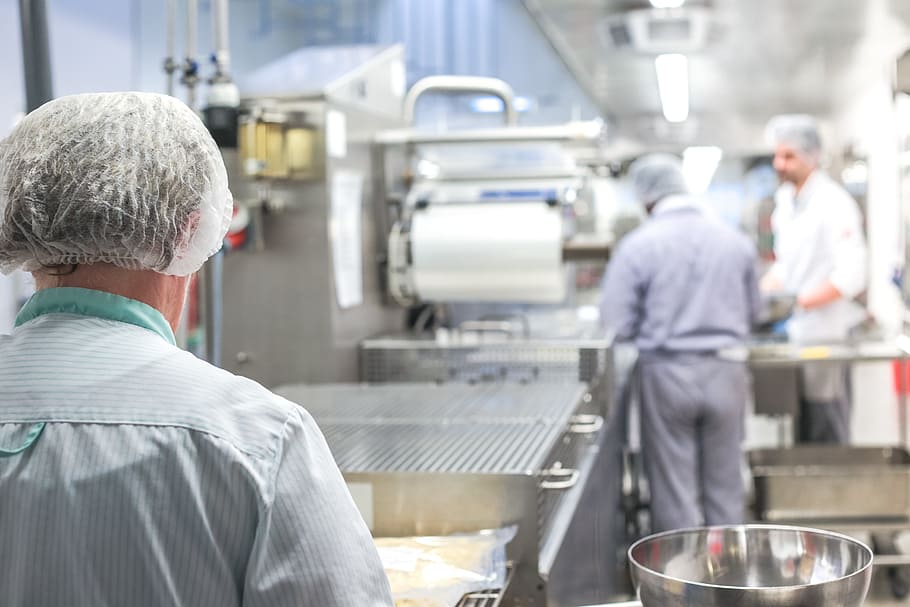 man near silver bowl, large kitchen, kitchen work, production HD wallpaper