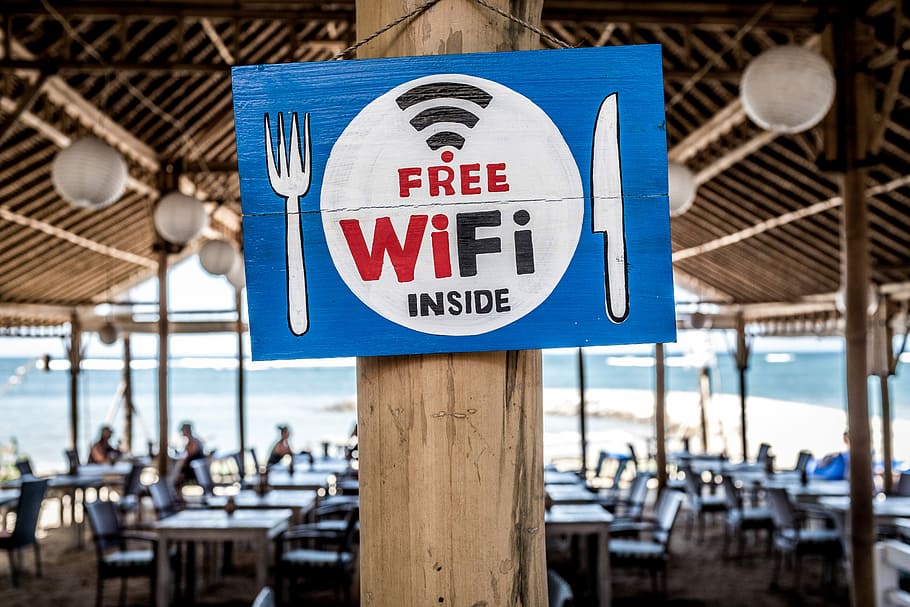 Free WiFi signage on wooden post, Free WiFi signage, inside, indonesia