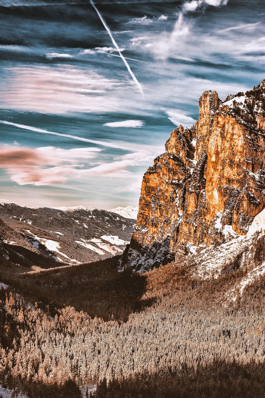 brown rock formation during daytime, rocky mountain and pine trees under cloudy sky HD wallpaper