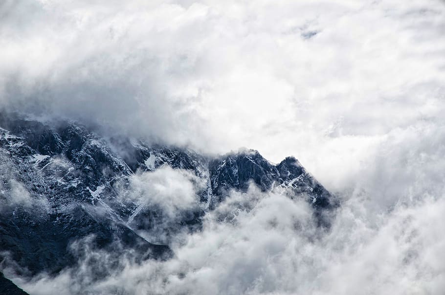 mountain covered with clouds, top view of alps mountain summit with sea of clouds HD wallpaper