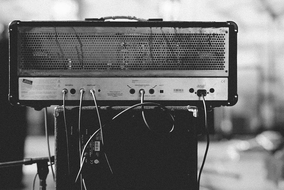 gray and black amplifier on speaker, black speaker on stand, black and white HD wallpaper