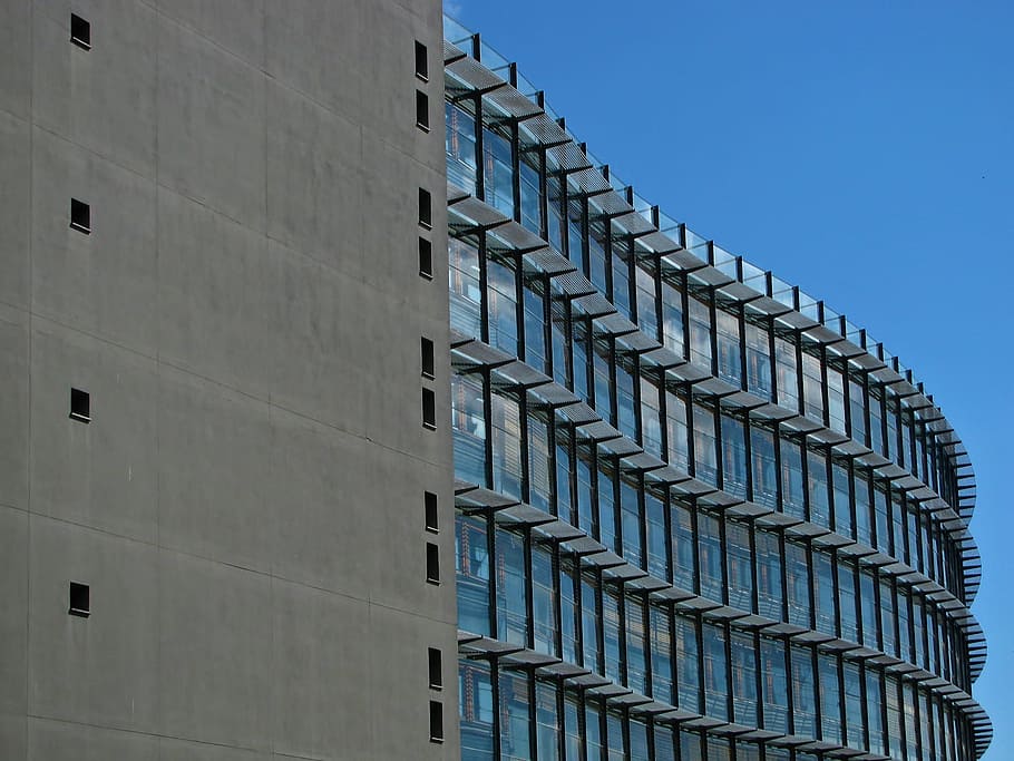 Grey Concrete Building With Blue Windows, architecture, design HD wallpaper
