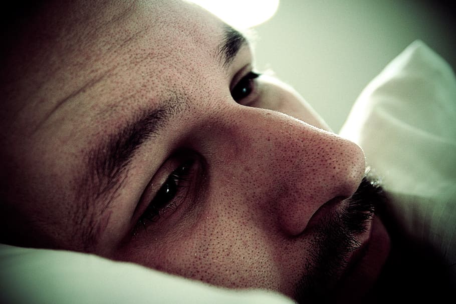micro photograph of man lying on pillow, depressed, depression HD wallpaper