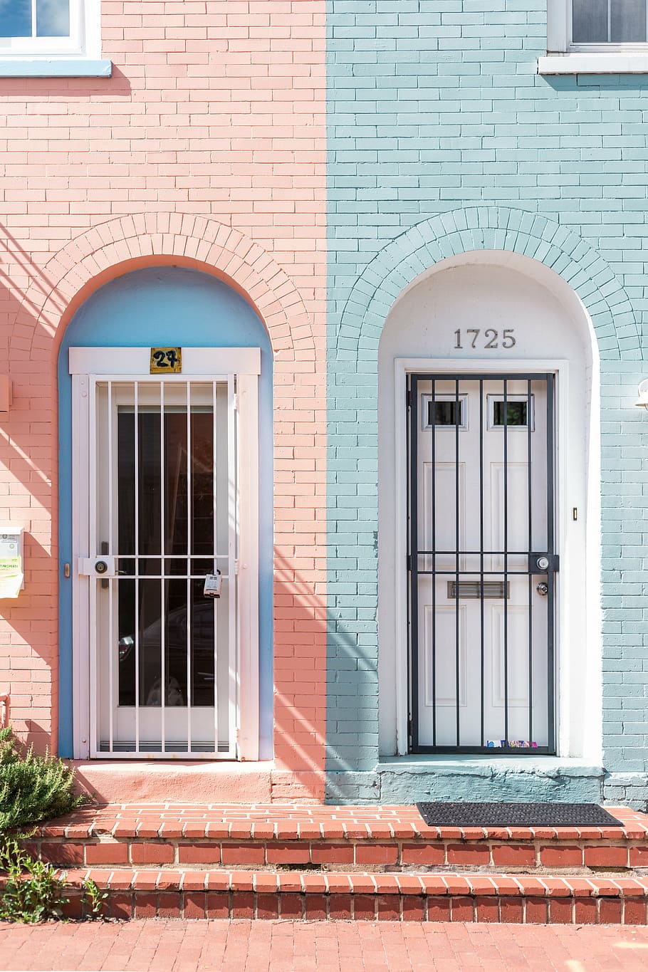 pink and blue brick buildings with metal doors, architecture HD wallpaper