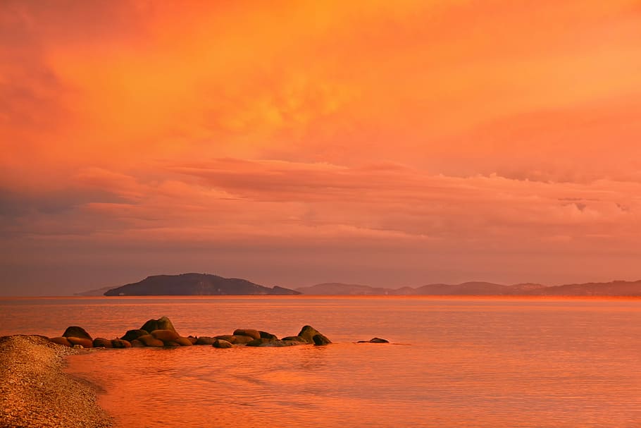 rocks surrounded by ocean during sunset, dusk, waters, evening HD wallpaper