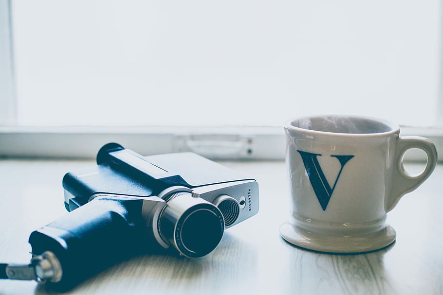 white and green ceramic mug on table, black camera and white ceramic mug HD wallpaper