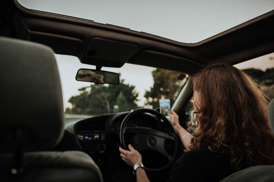 woman inside car driving, woman driving vehicle, interior, drive