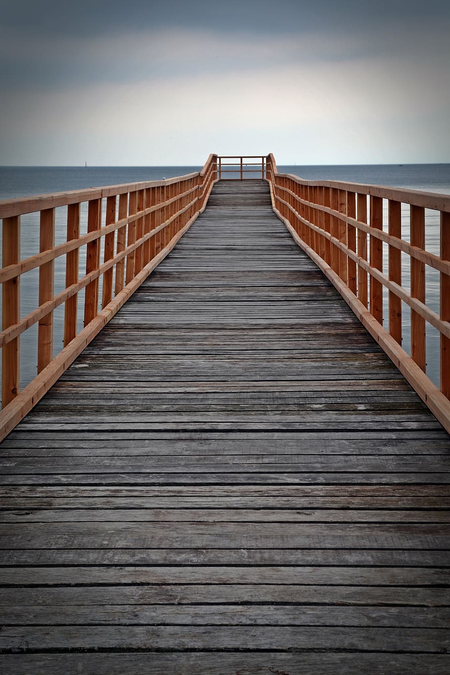 black and brown wooden dock near blue body of water under sky during daytime HD wallpaper