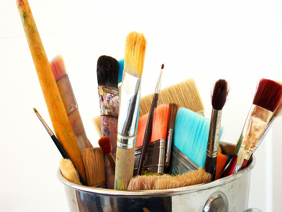assorted brushes on stainless steel bucket, paint, art, painting