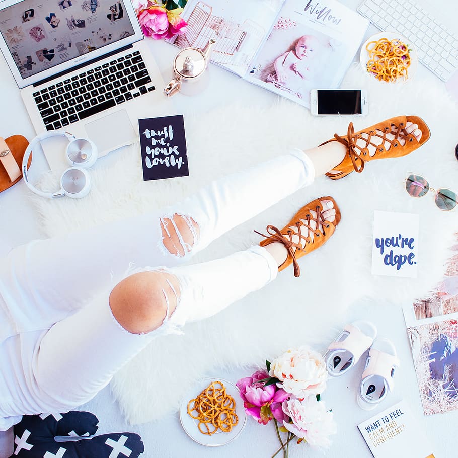 person wearing distressed white pants and brown suede lace-up sandals, person wearing distressed white denim jeans and brown strappy flat sandals HD wallpaper