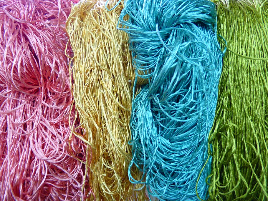 four assorted color of ropes, wool, fabric, tissue, colorful