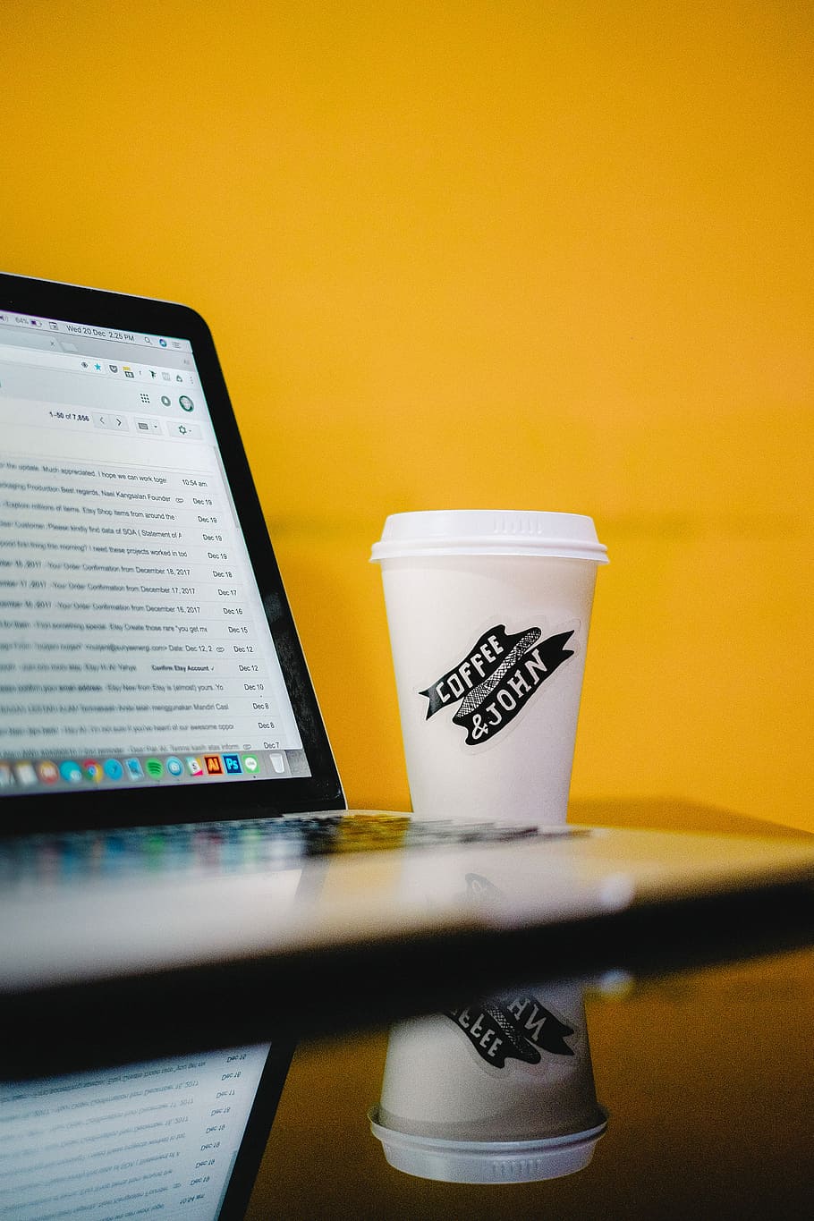 coffee & john-printed cup with lid beside MacBook, white coffee cup near laptop computer on table HD wallpaper