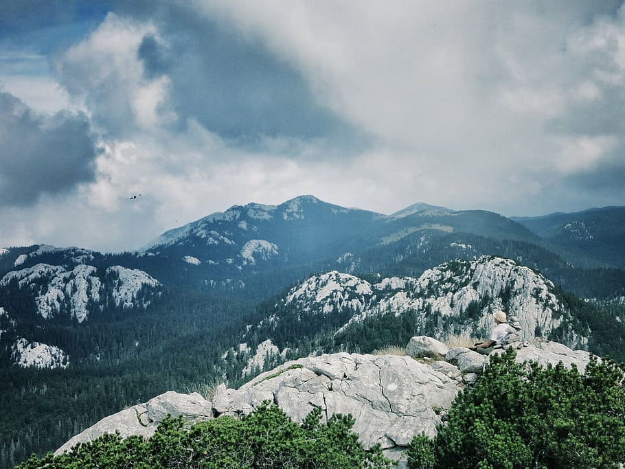 mountains, wondering, person, clouds, hills, sky, peak, nature HD wallpaper