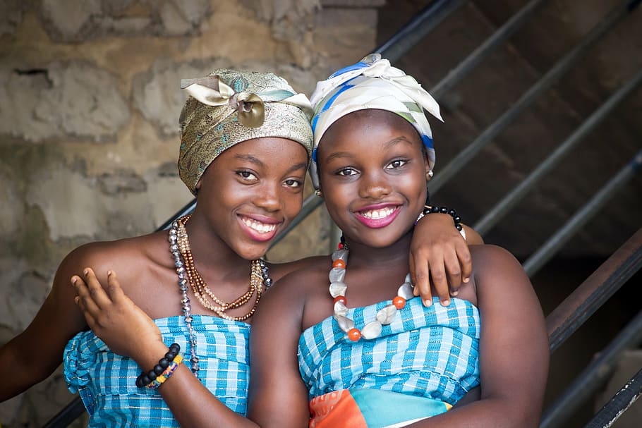 two women wearing blue and white shirts, african, girls, students