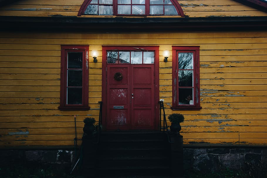 photo of brown painted house, brown wooden closed door near window pane at daytime HD wallpaper