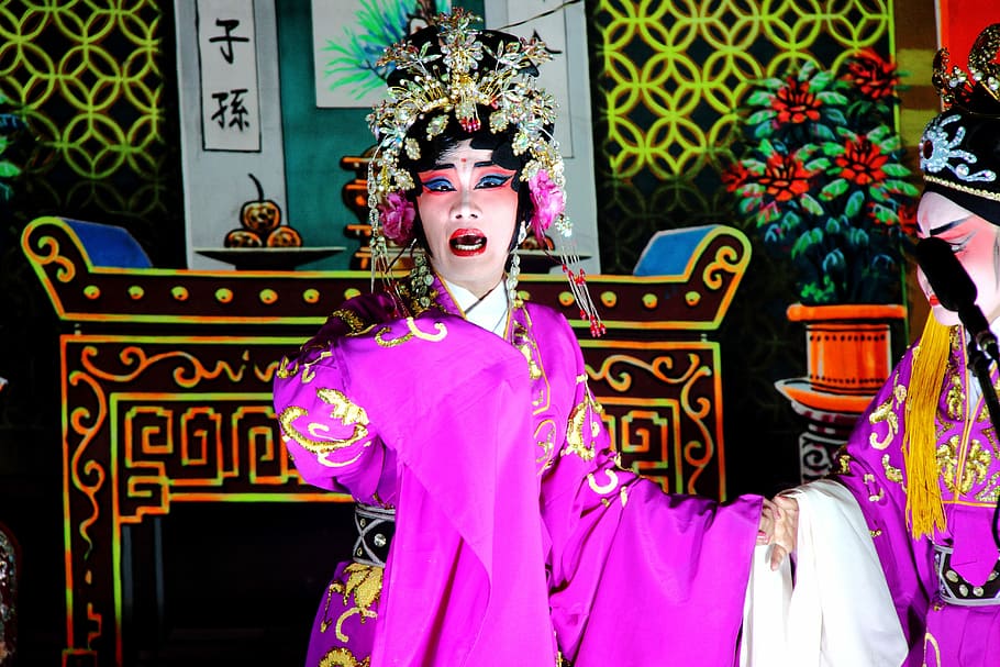singing woman wearing pink and white traditional dress and gold-colored headpiece HD wallpaper