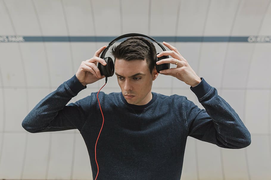 man about to wear black headphones, people, guy, sound, music, HD wallpaper