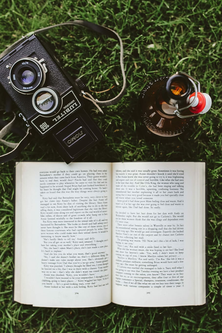 Book on the grass, reading, leaf, literature, camera - Photographic Equipment HD wallpaper