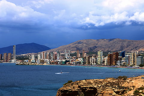 bird's-eye view photography of buildings near body of water HD wallpaper