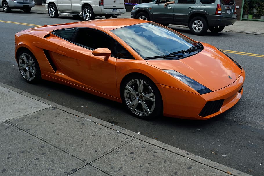 orange Lamborghini Gallardo parked on sidewalk, car, fast car
