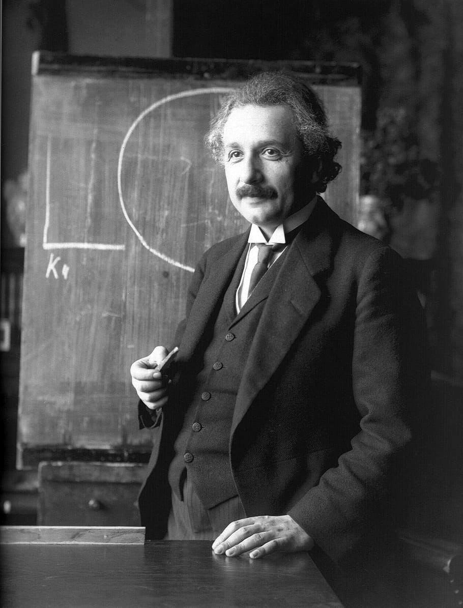 photography of Albert Einstein, classroom, blackboard, professor