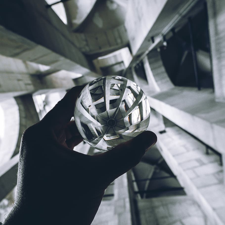White Mirror, person holding round gray metal ball, hand, ceiling HD wallpaper