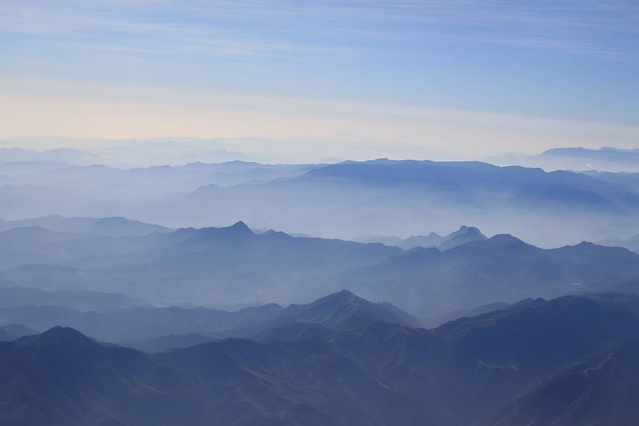 aerial photography of mountains during daytie, photo of mist covered mountains HD wallpaper