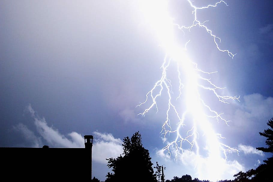 time-lapse photography of lightning and silhouette of trees HD wallpaper