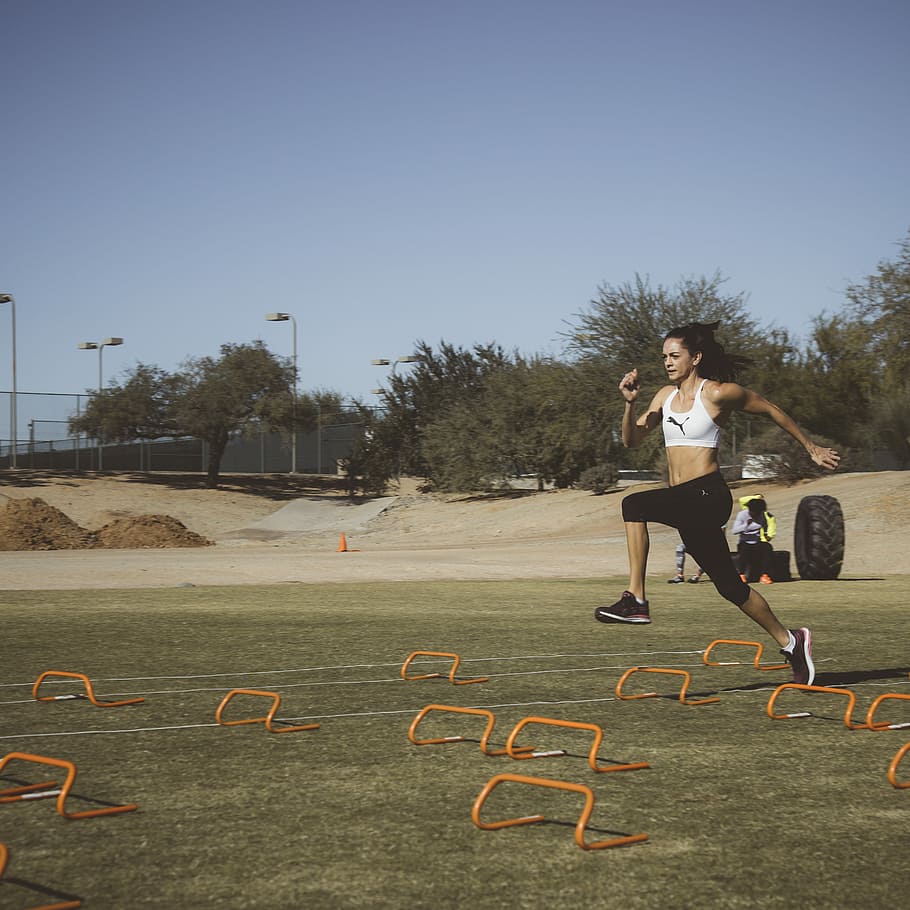 woman jumping on brown steel frames, athlete, run, training HD wallpaper