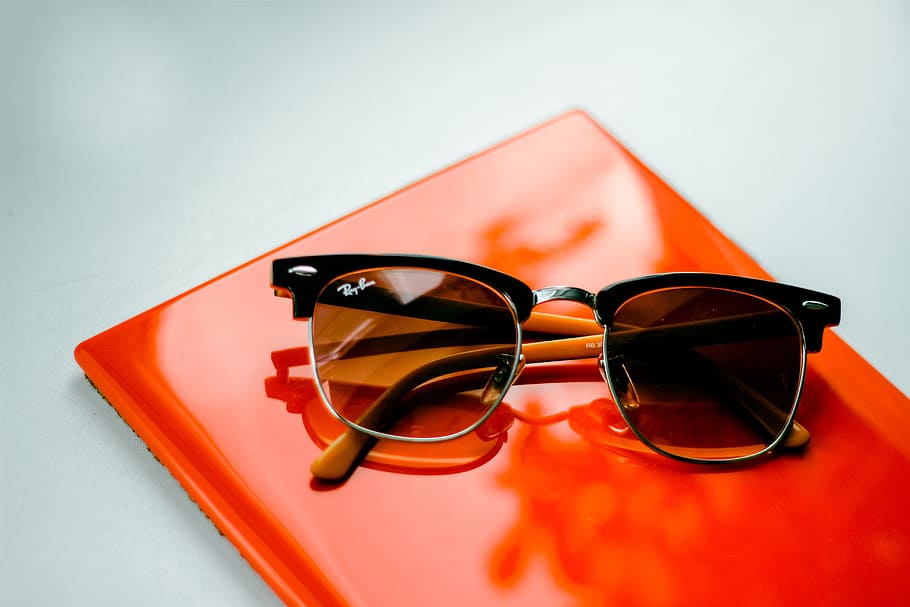 Sunglasses sitting on office table, various, business, technology HD wallpaper