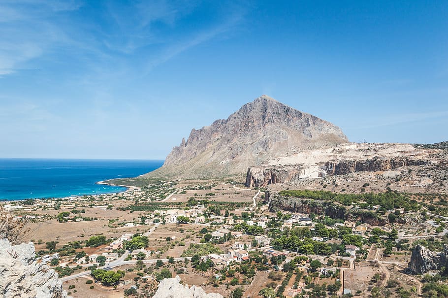 panoramic photography of butte, mountain near body of water panoramic photography HD wallpaper