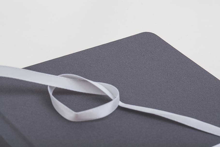 book, notebook, ribbon, studio shot, gray, no people, indoors HD wallpaper