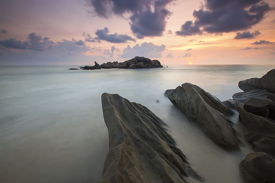 Rock Near a White Foggy Area Under an Orange Sky, clouds, landscape HD wallpaper