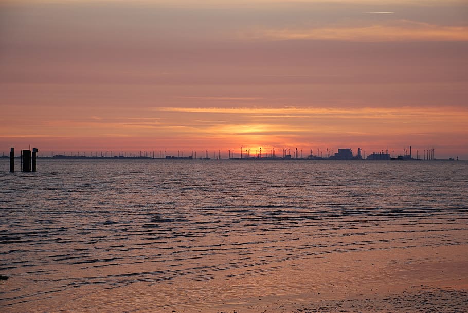 sunset, afterglow, emden, knock, coast, sky, water, sea, architecture HD wallpaper